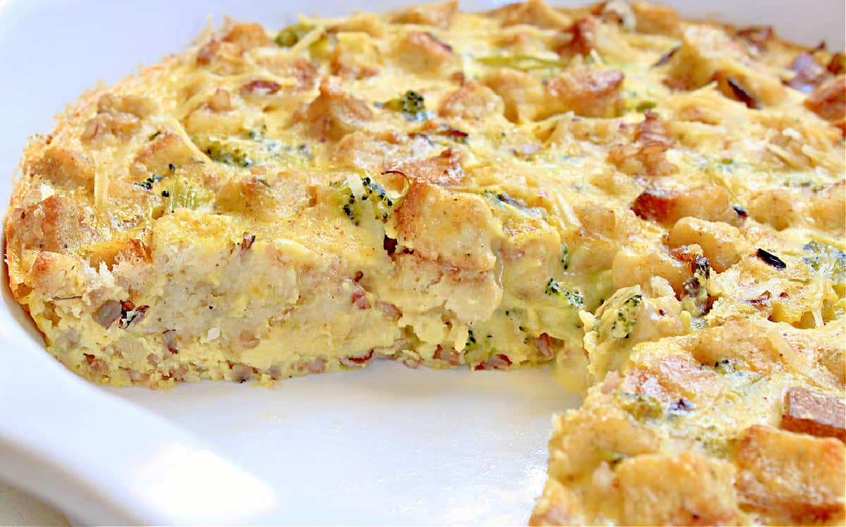 A close-up view of the Leftover Stuffing Frittata with one slice taken out of the plate.