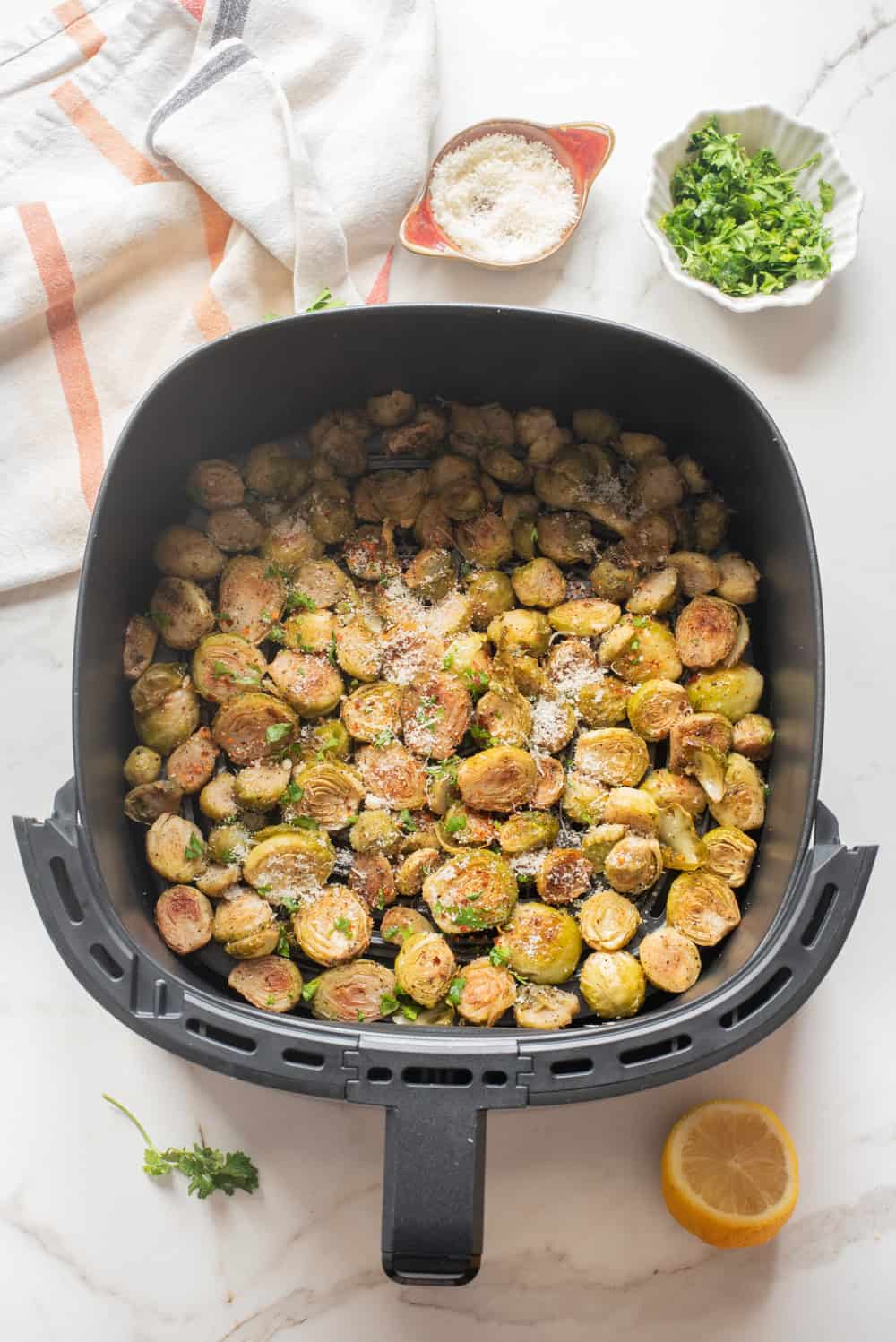 Cooked Brussels sprouts after air frying until golden and crispy.