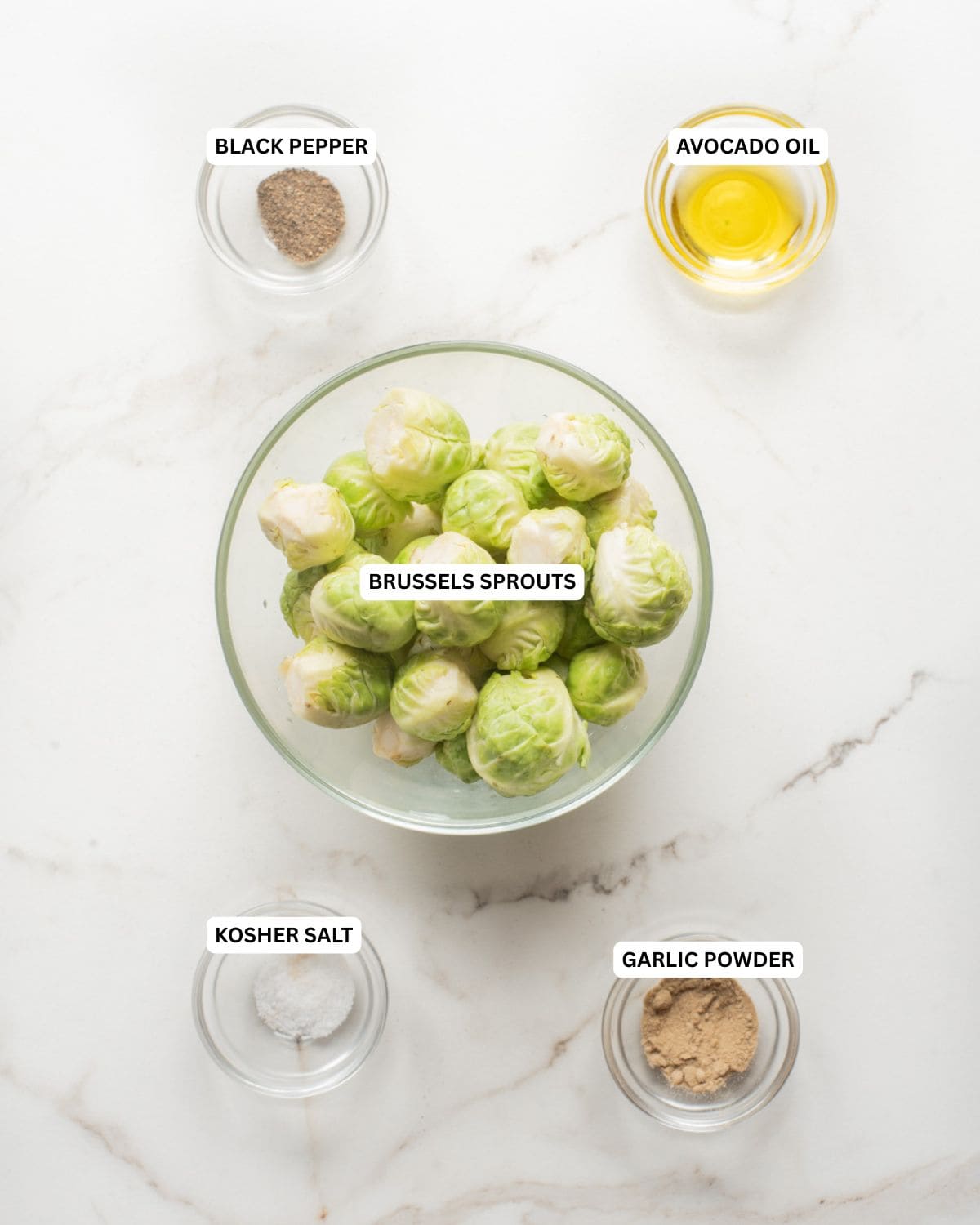 Overhead image of the ingredients for air fryer Brussels sprouts.