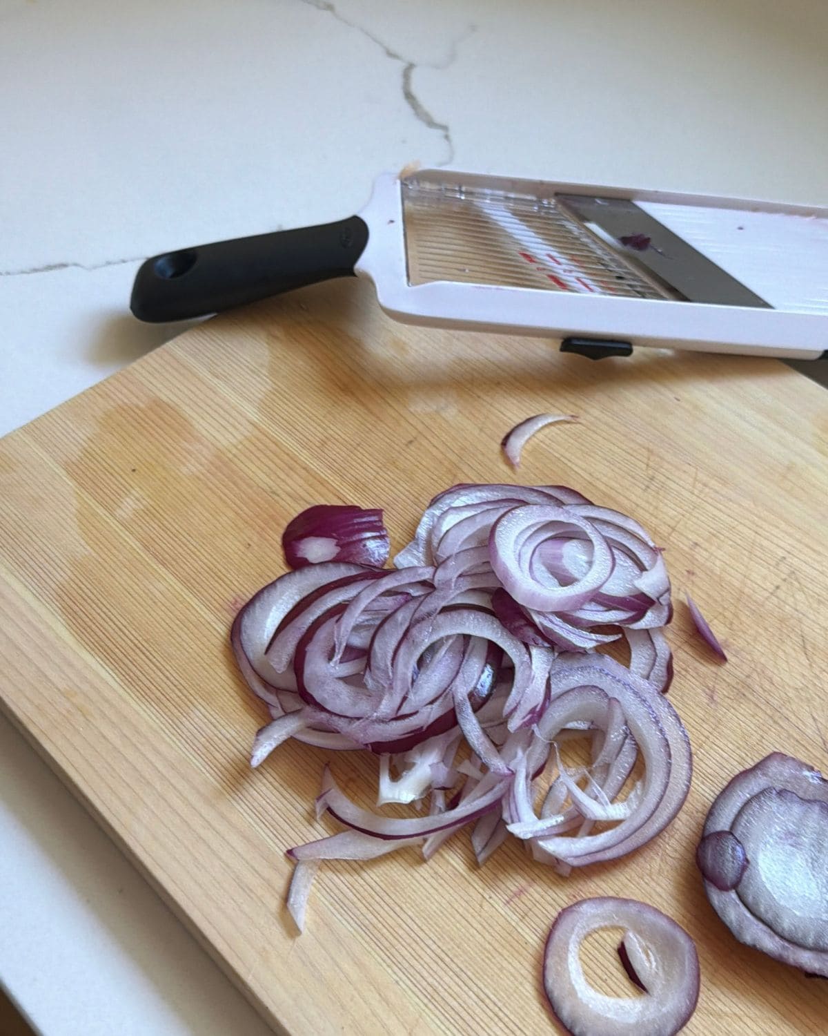Onions sliced thin. for apple cheddar tart.