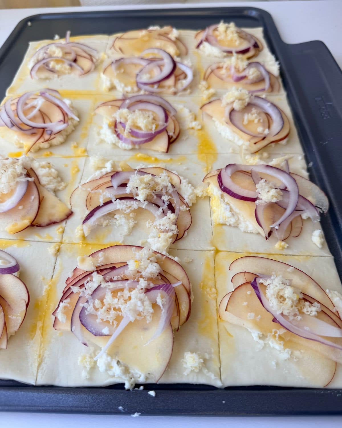 Apple cheddar tart before baking.