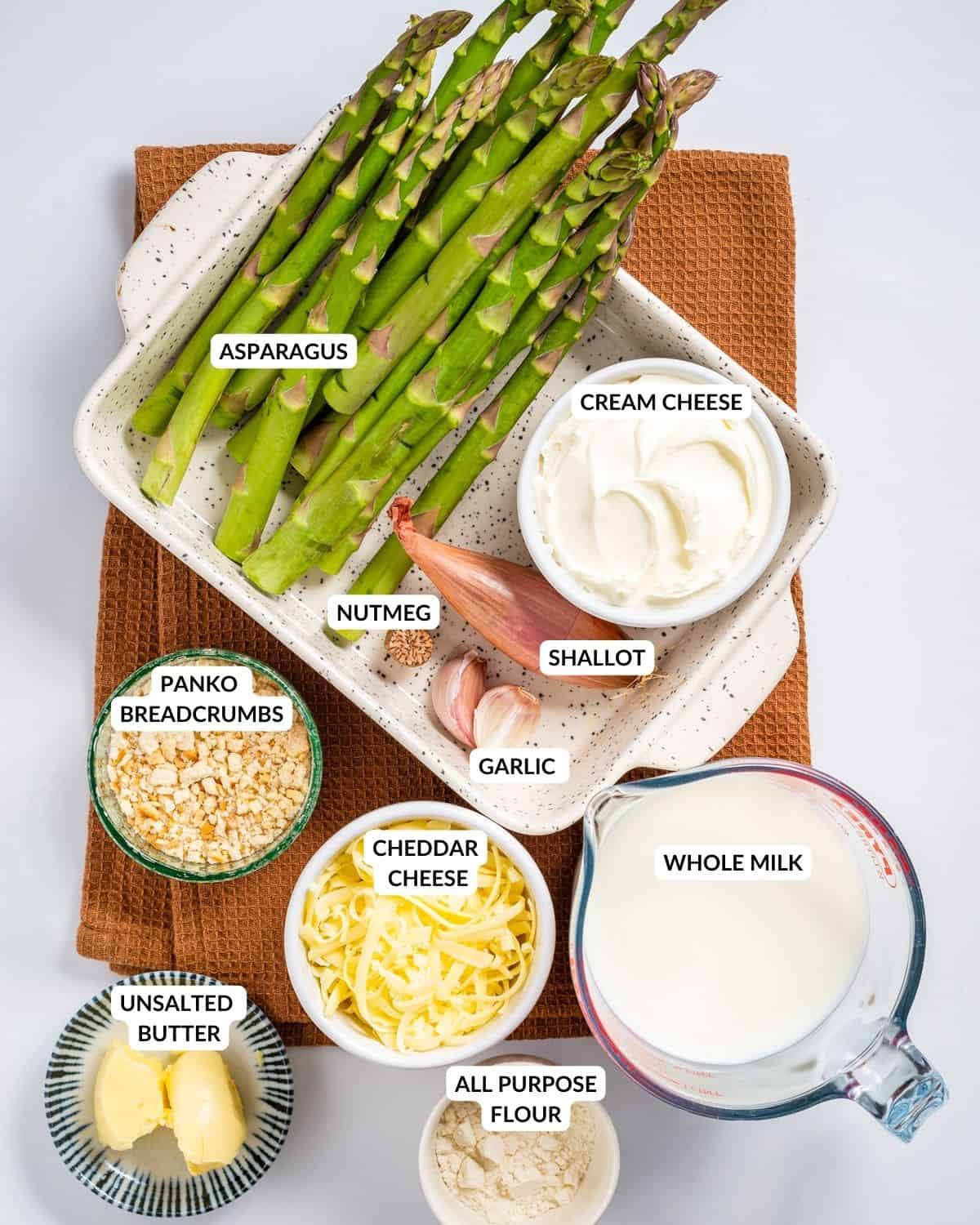 Labeled ingredient list for asparagus casserole - check recipe card for details!