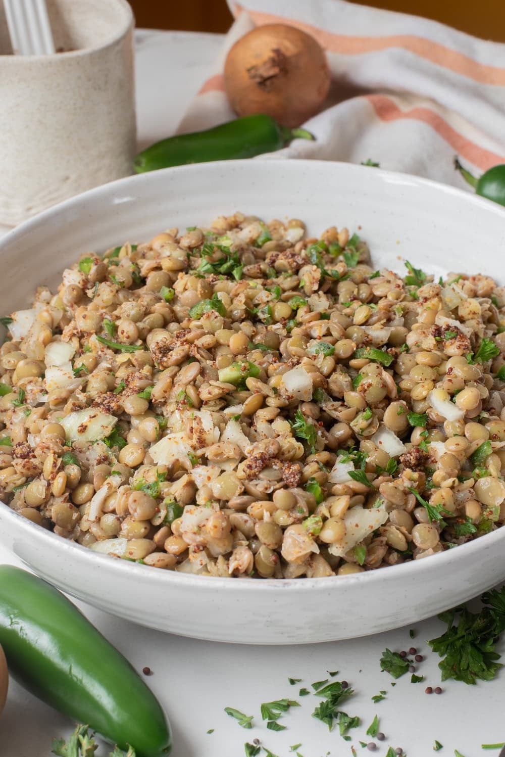 Close-up of azifa Ethiopian lentil salad with herbs and mustard dressing.