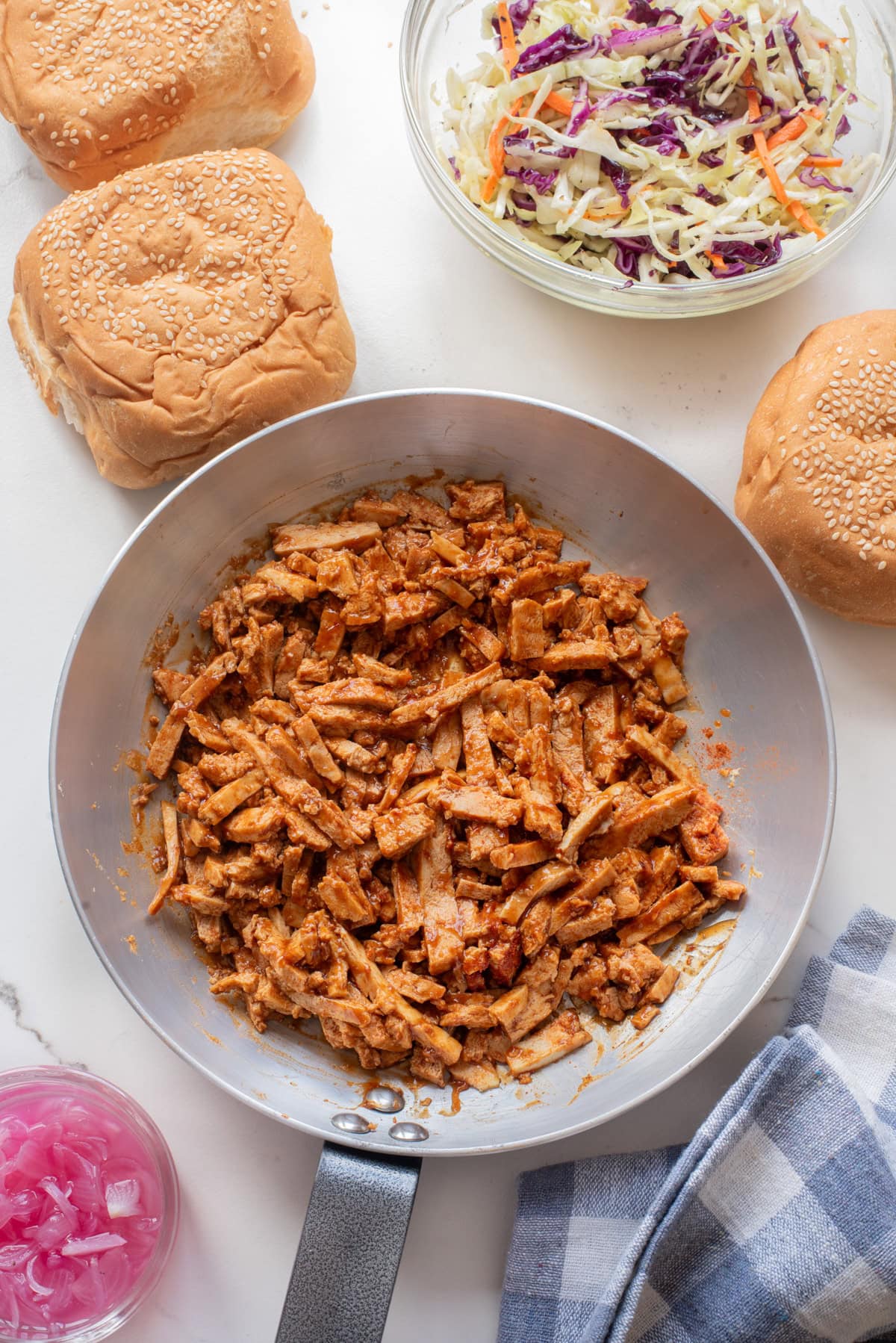 An overhead image of BBQ tofu in on a skillet.