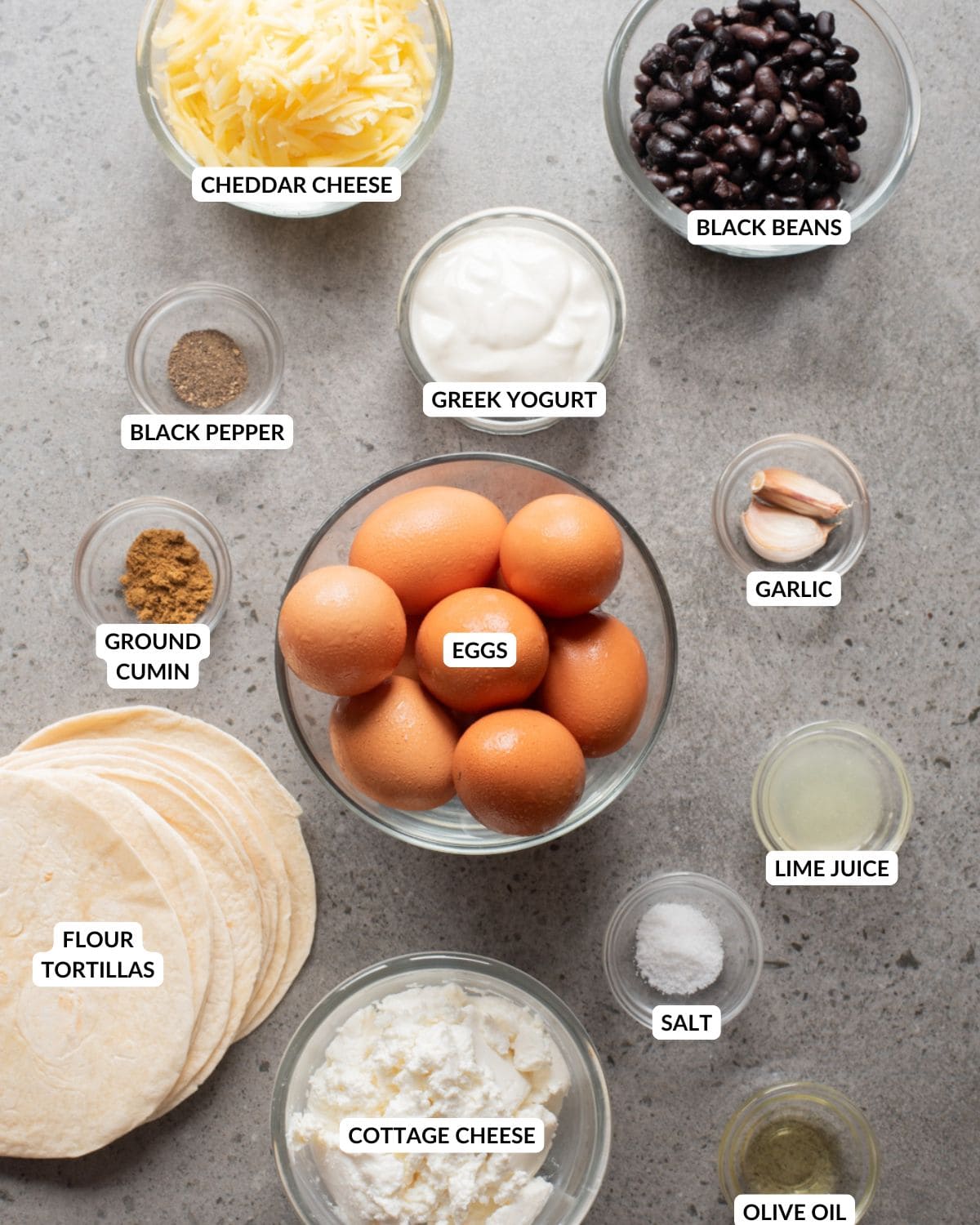 An overhead image of the ingredients of crispy cheese breakfast tacos.