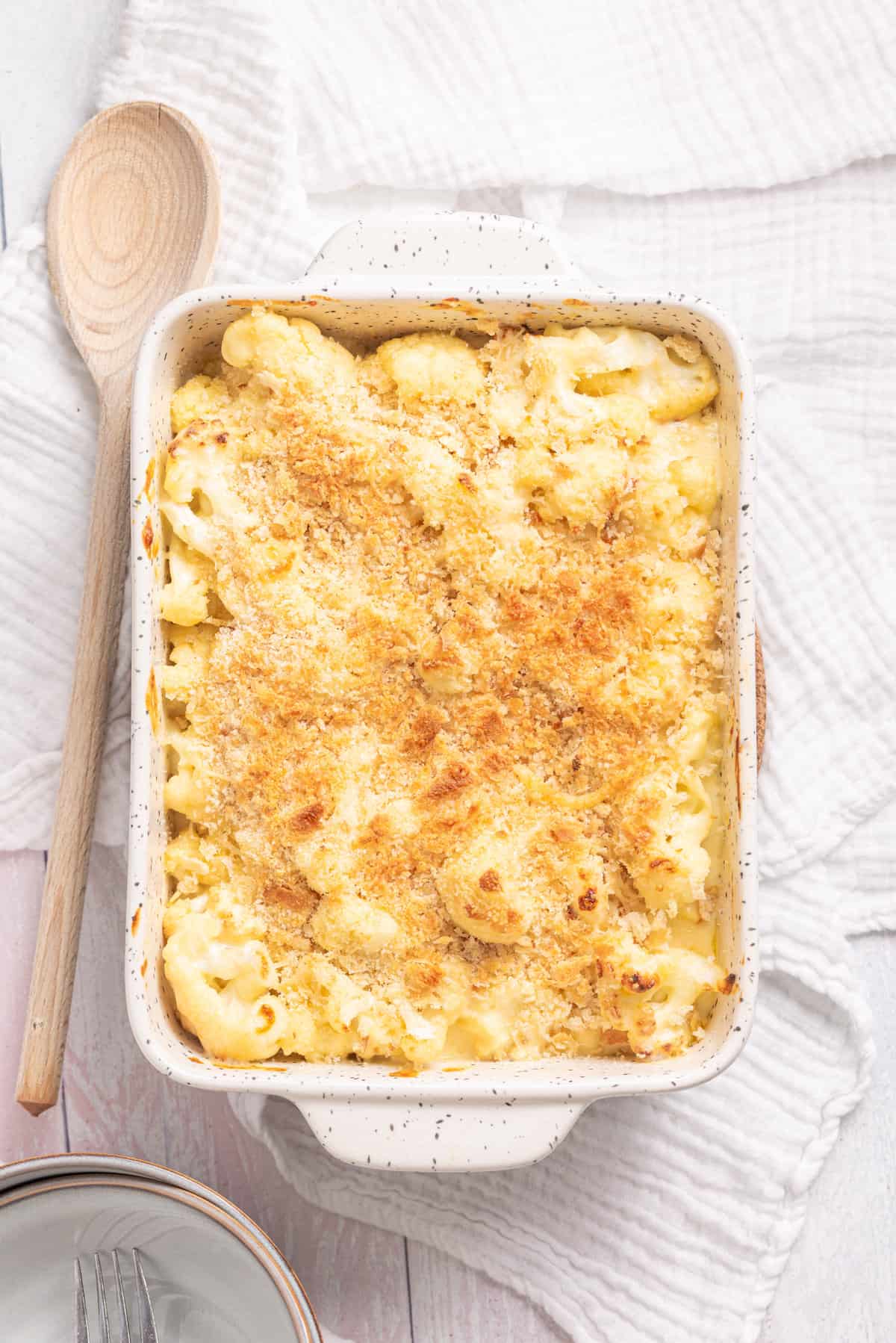 An overhead image of baked cauliflower with cheese.