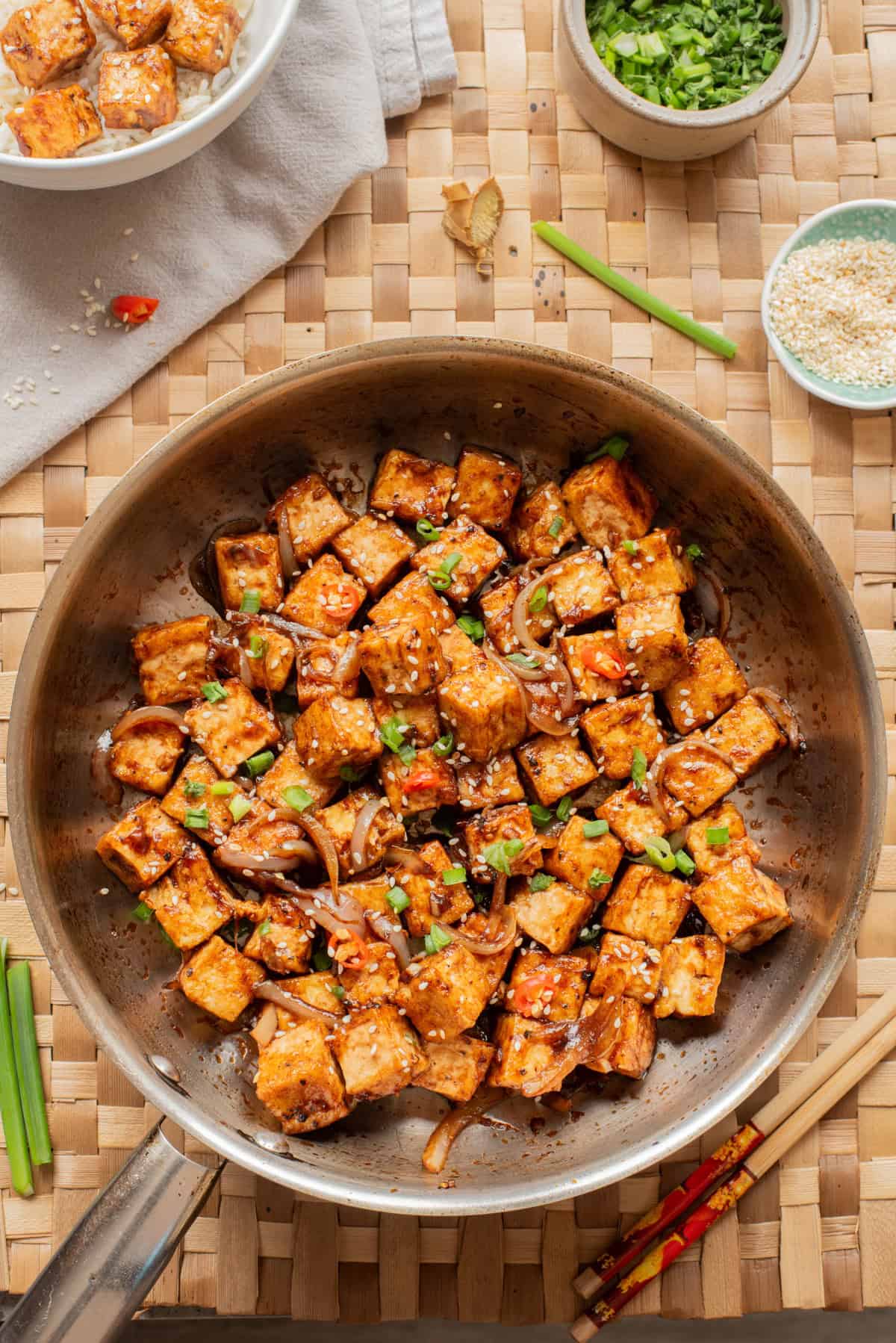 An overhead image of black pepper tofu in a skillet.