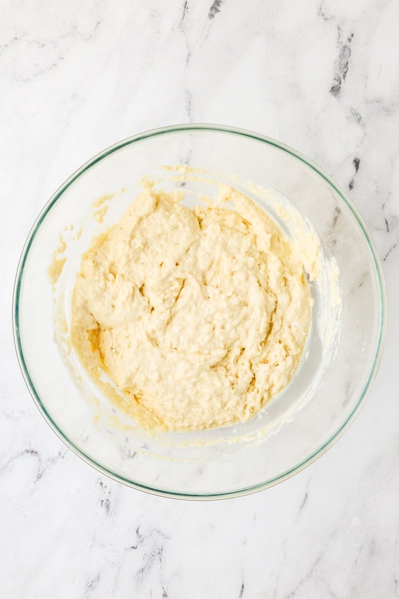 An overhead image of combining the wet and dry ingredient batter.