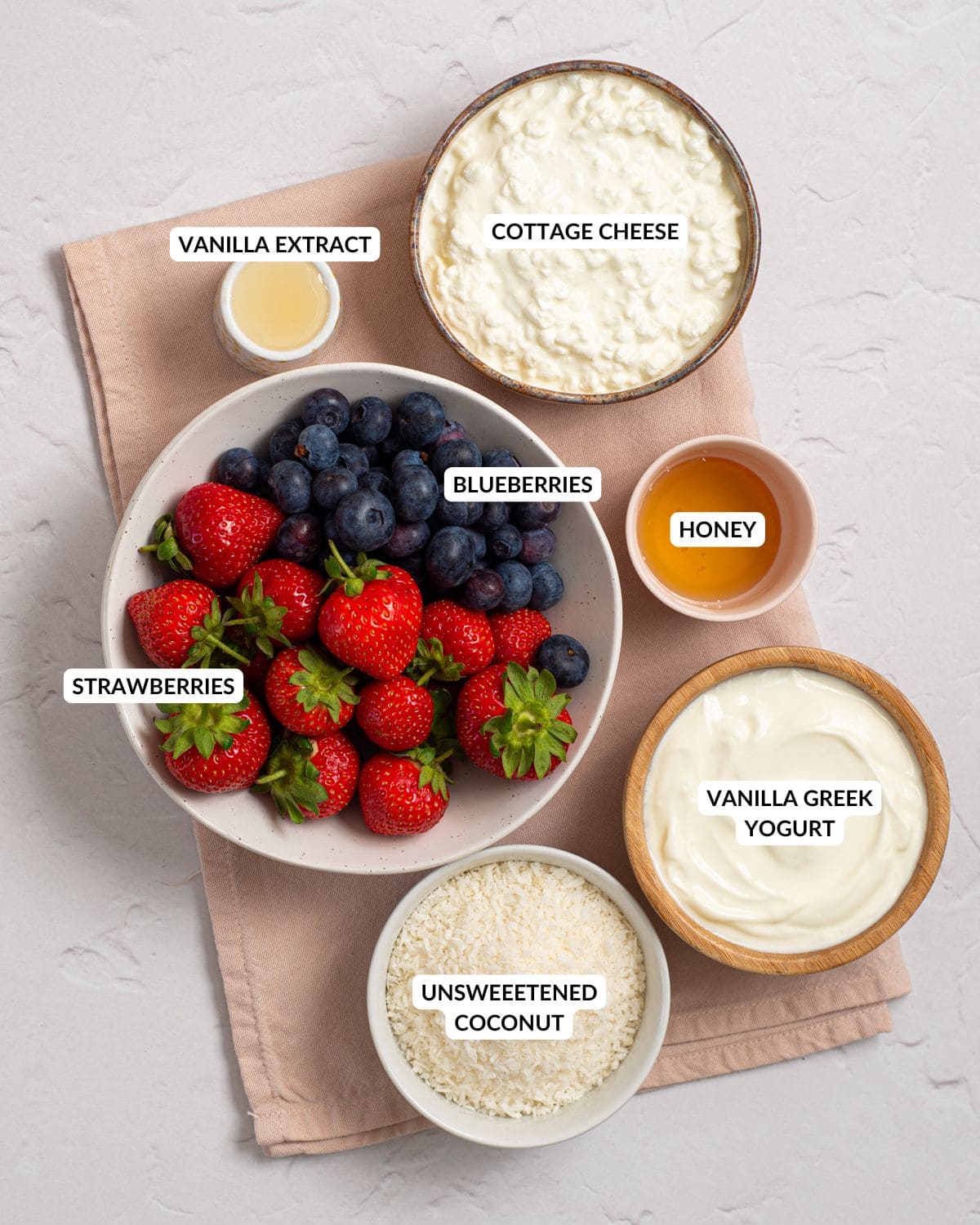 Ingredients for cottage cheese bark arranged in bowls.