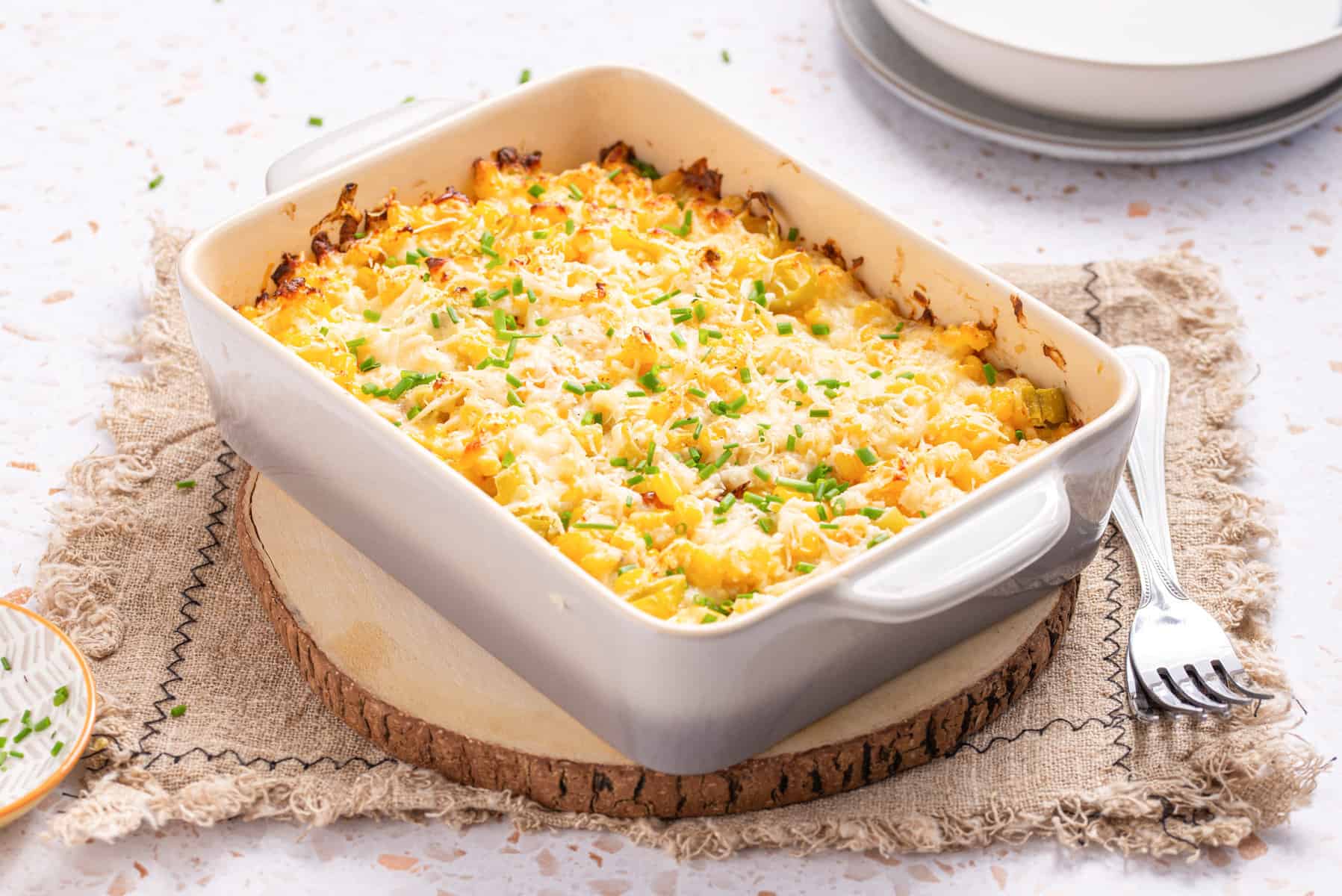 An image of corn casserole with cream cheese, ready to be served