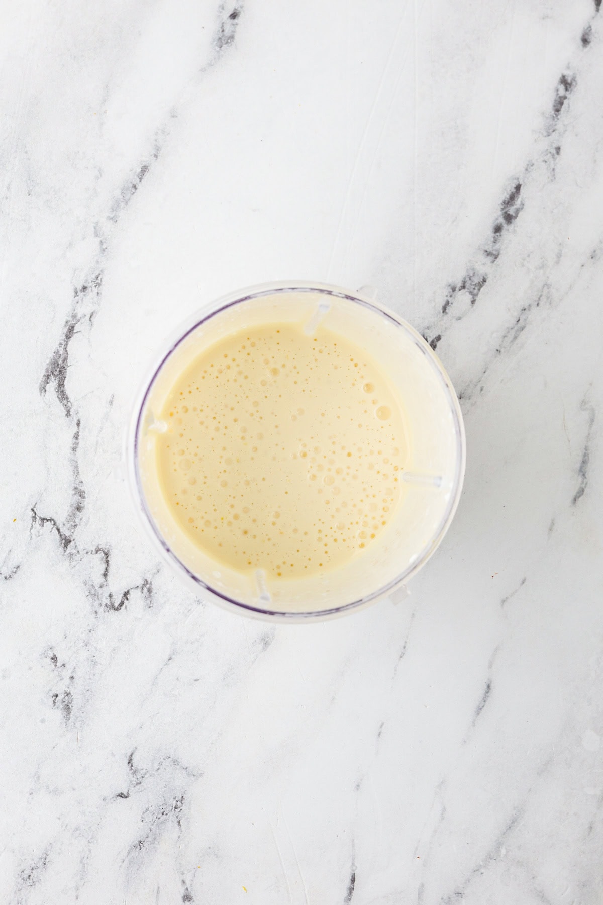 An overhead image of blending the wet ingredients together.