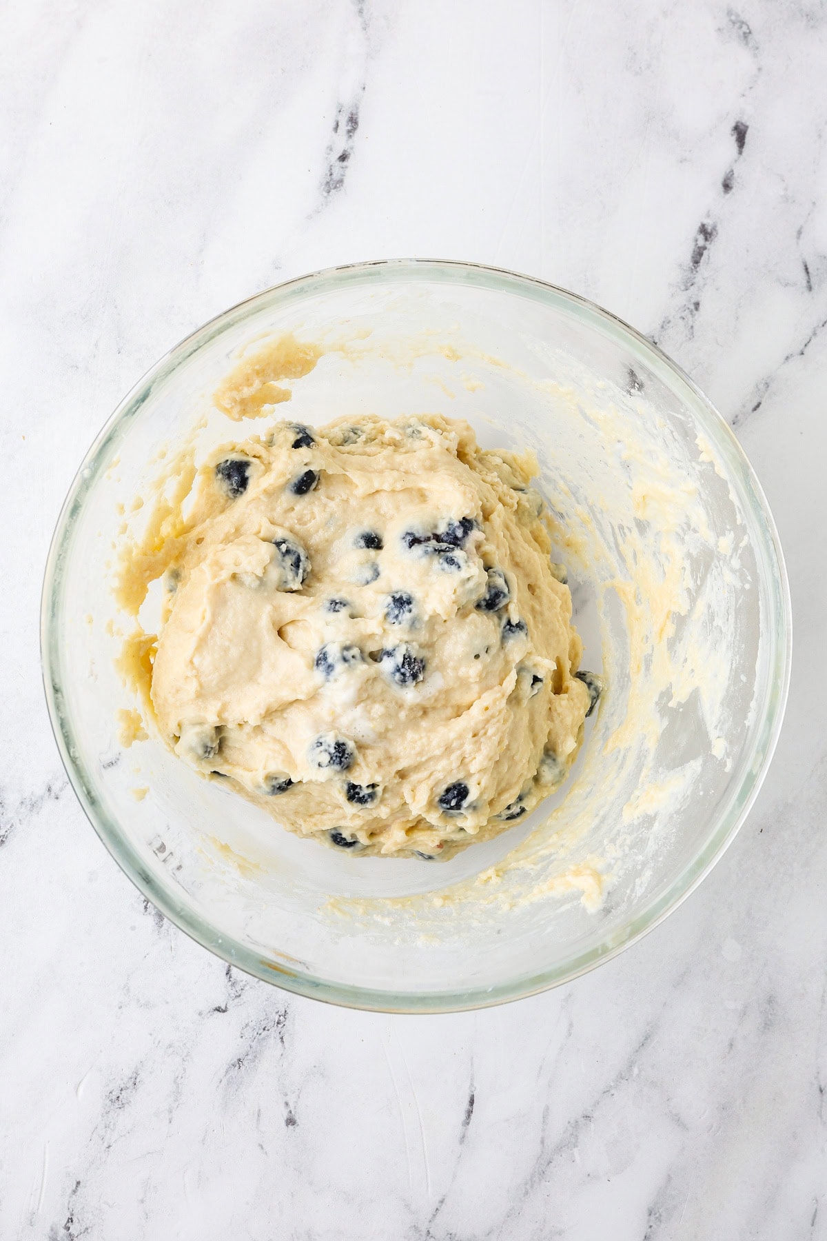 An overhead image of folding in the fresh blueberries.
