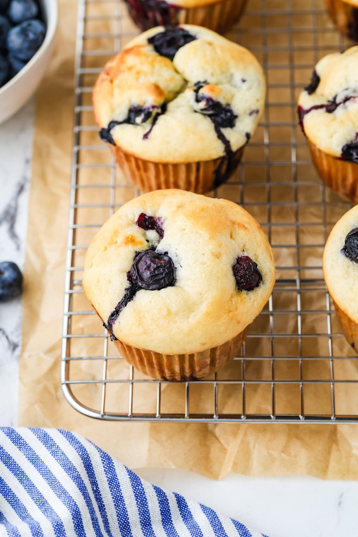 A close up image of a cottage cheese blueberry muffin.