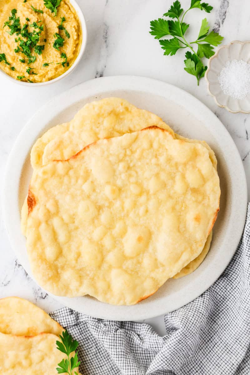 An overhead image of the baked flatbread on a plate.