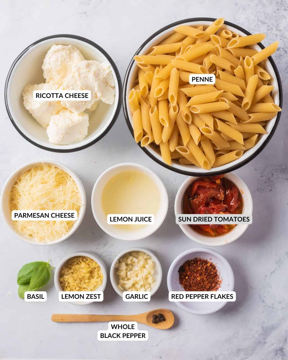 Labeled ingredient list for creamy sun-dried tomato pasta - check recipe card for details!