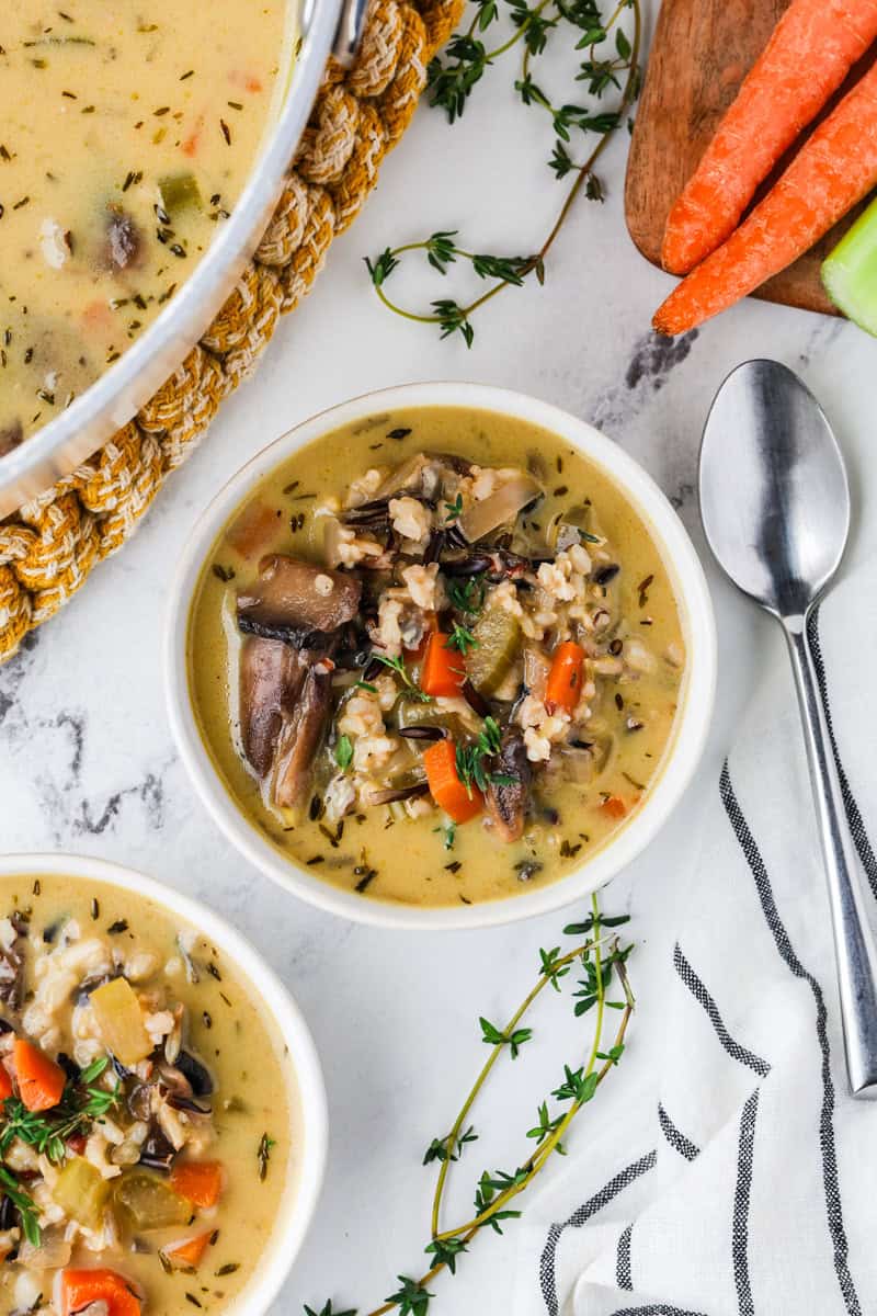 An overhead image of serving the creamy wild rice soup.