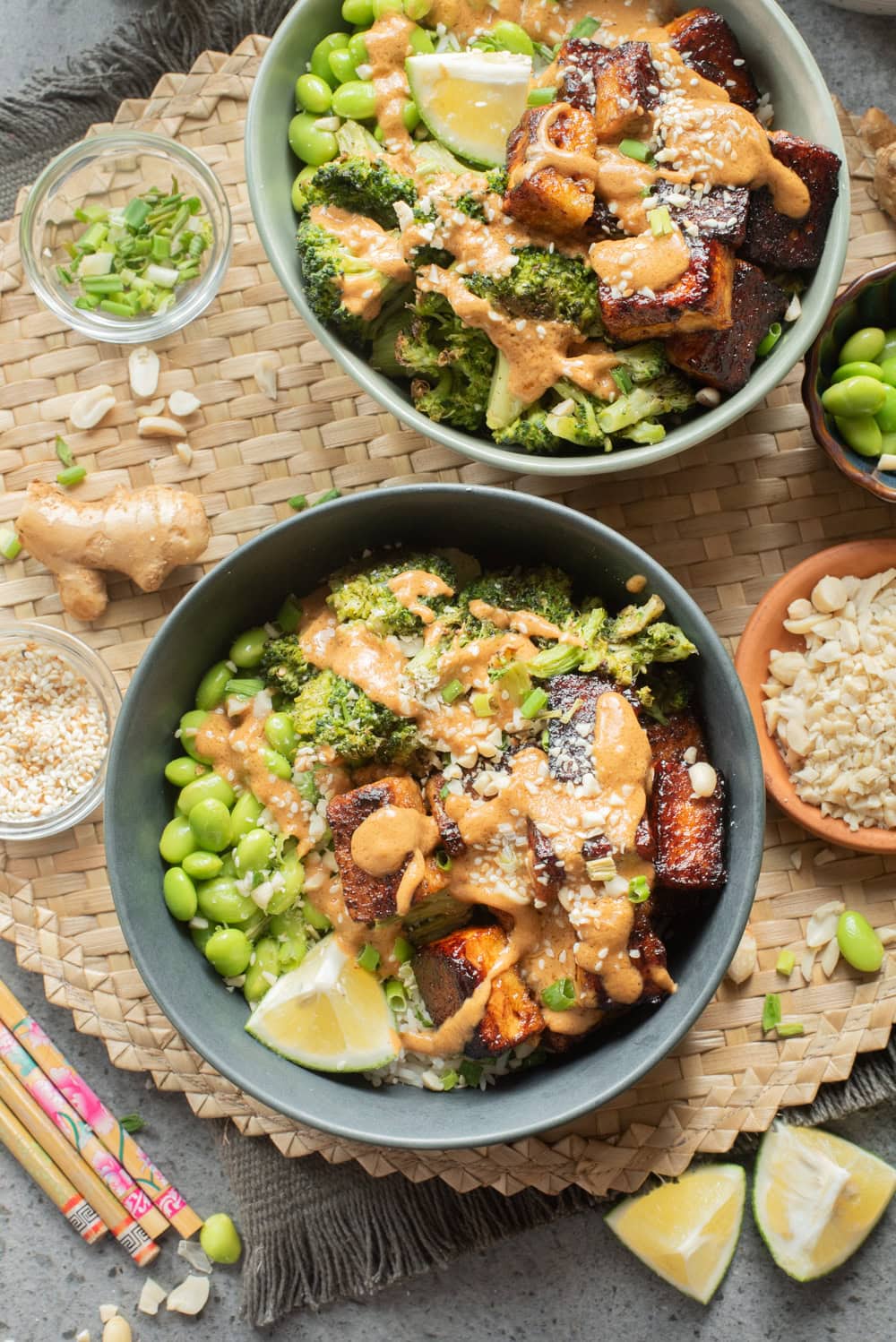 An overhead image of serving two bowls of crispy peanut tofu.