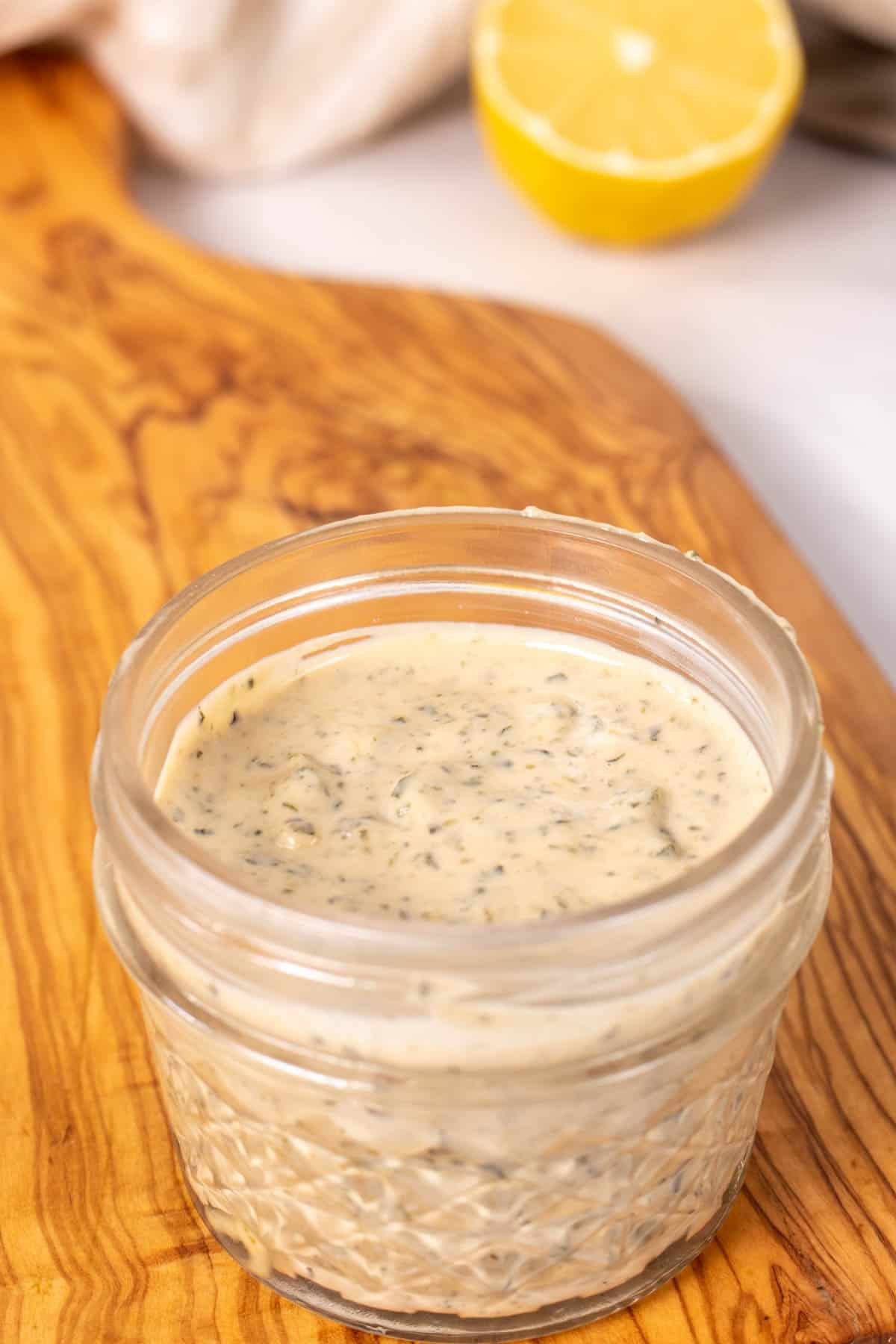 Close up shot of dressing in a glass jar 
