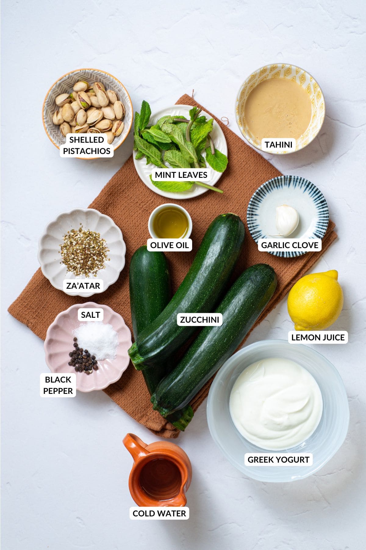 An overhead image of the ingredients of grilled zucchini.