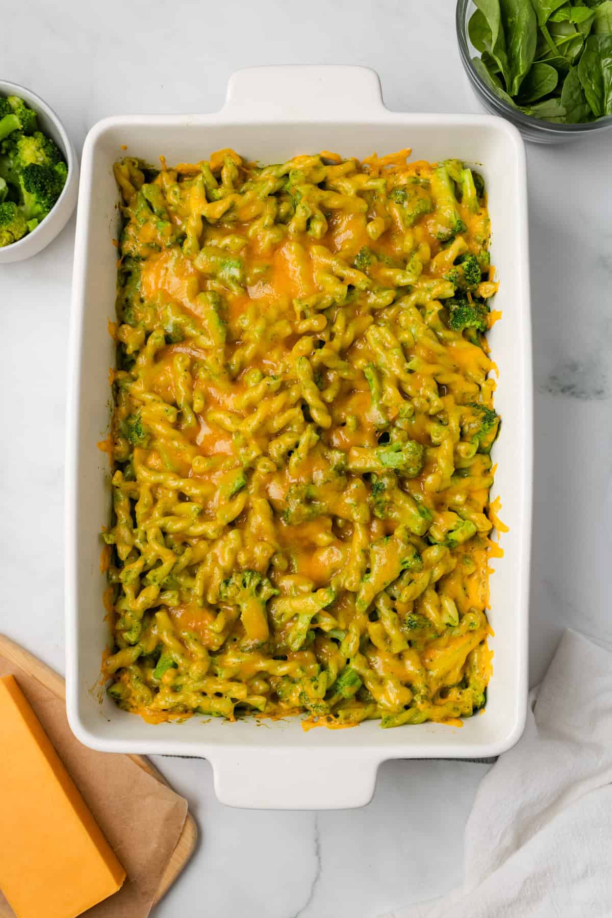 An overhead image of baked green goddess pasta bake.