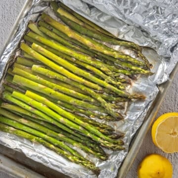 Close up of grilled asparagus in foil packets