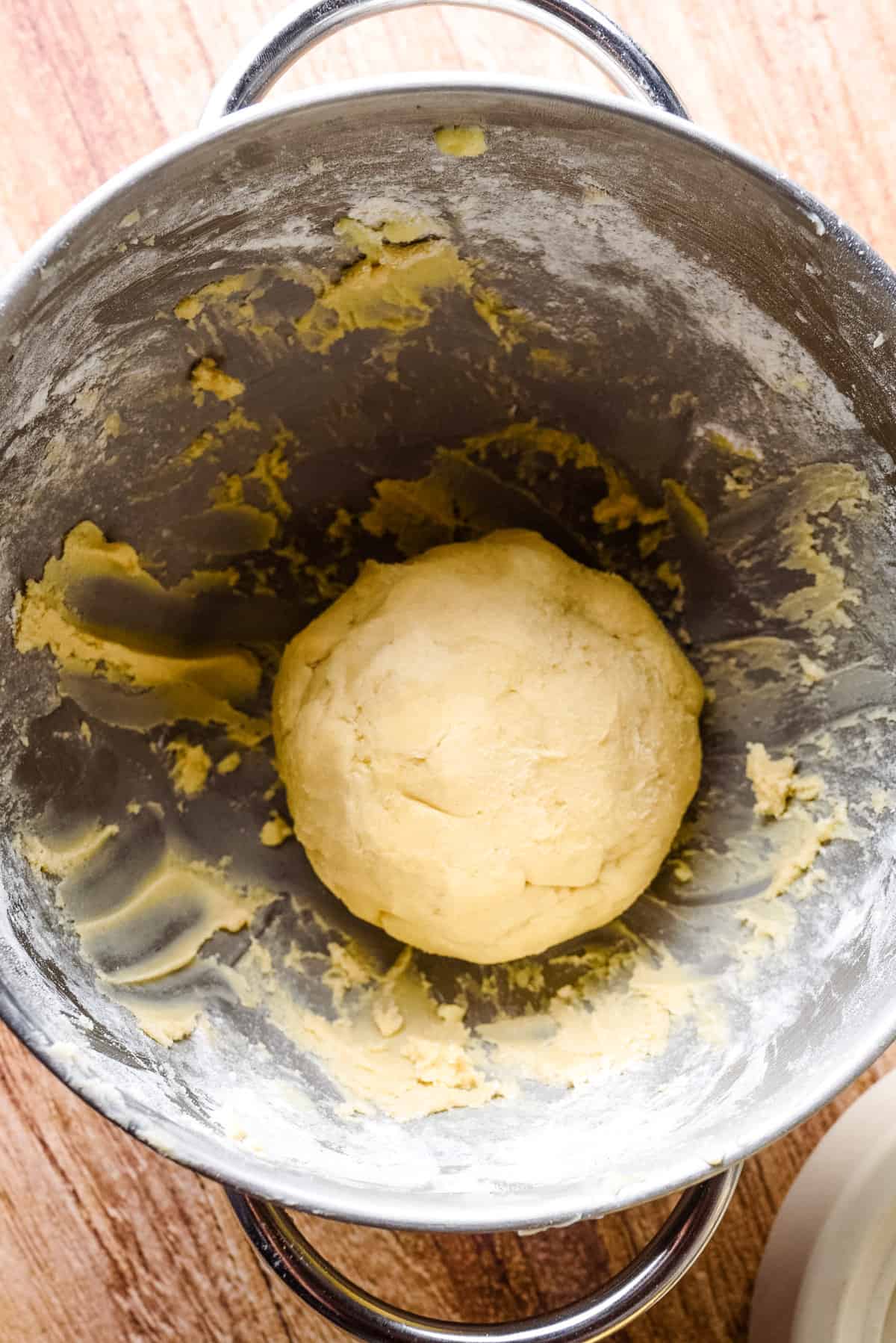 Overhead view of cookie dough in mixing bowl.