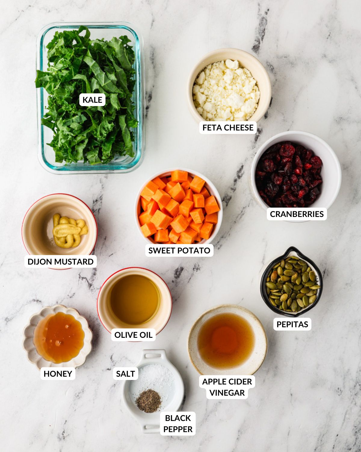 An overhead image of the ingredients of kale sweet potato salad.