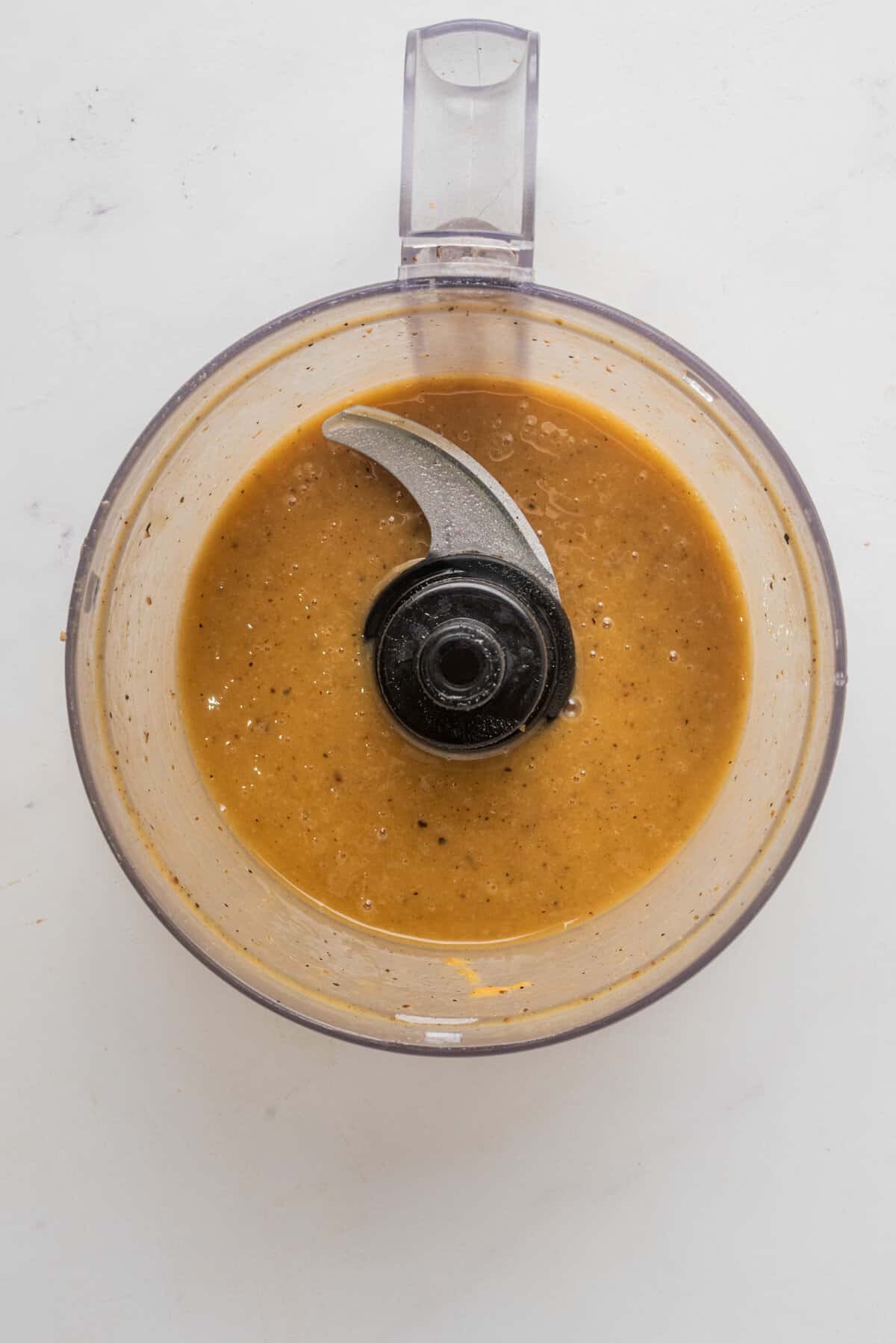 An image of the salad dressing mixed in a blender.