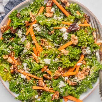 An overhead image of kale salad in a large serving bowl.