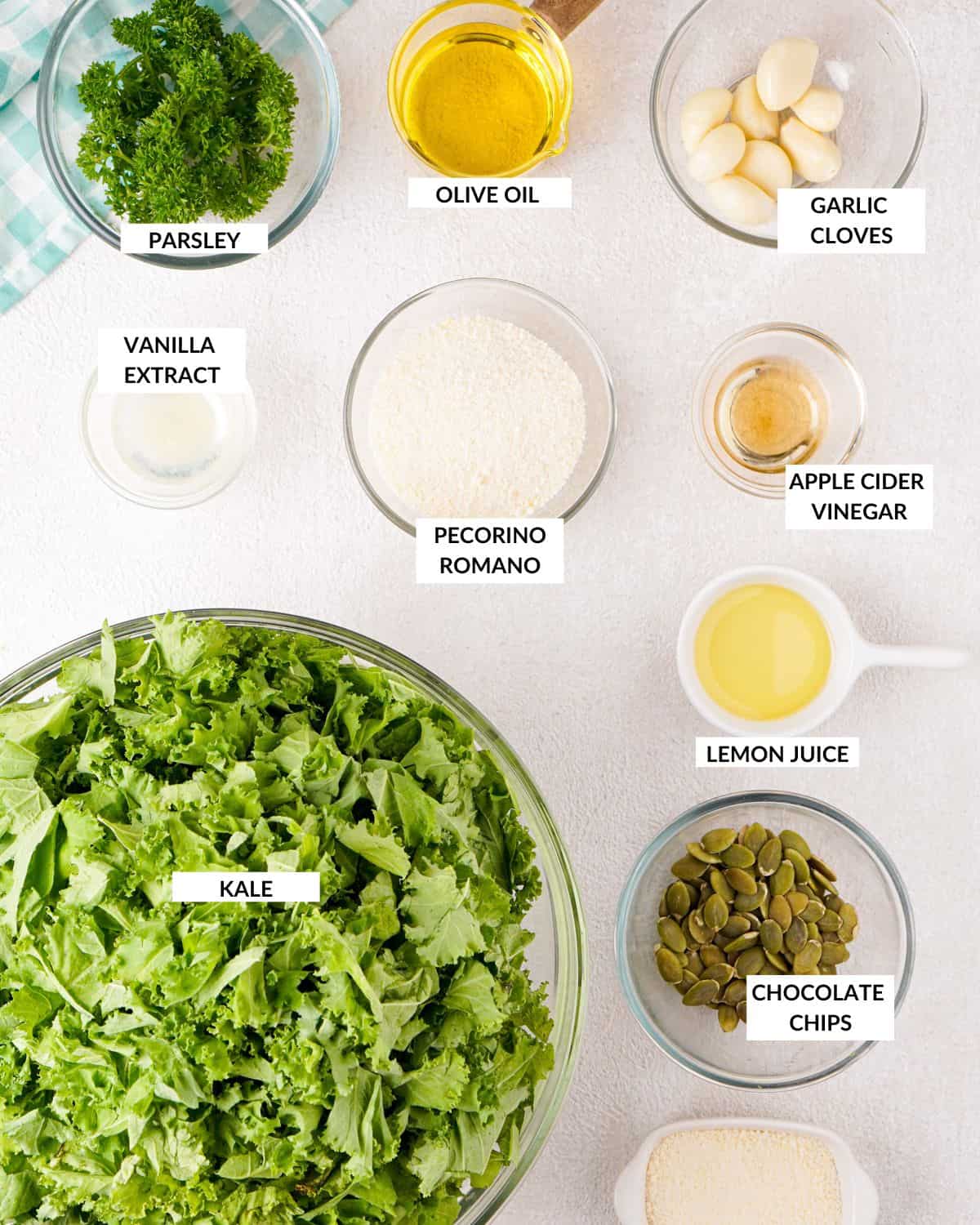 Labeled ingredients for making this garlic kale salad - check recipe card for details. 
