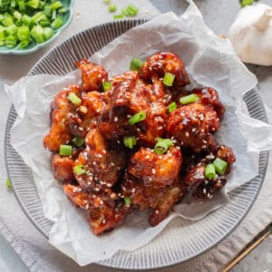 An overhead image of Korean fried cauliflower on a serving plate.