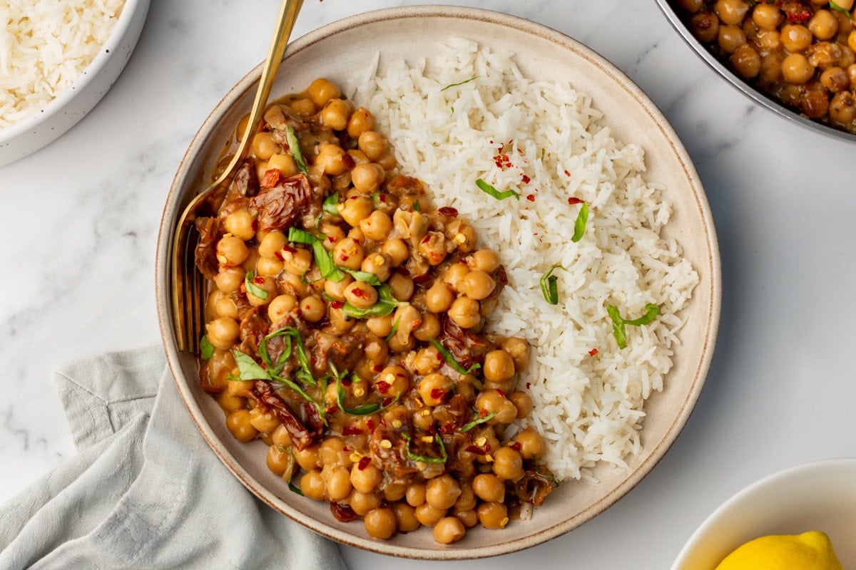 An overhead image of marry me chickepas served on a plate with rice.