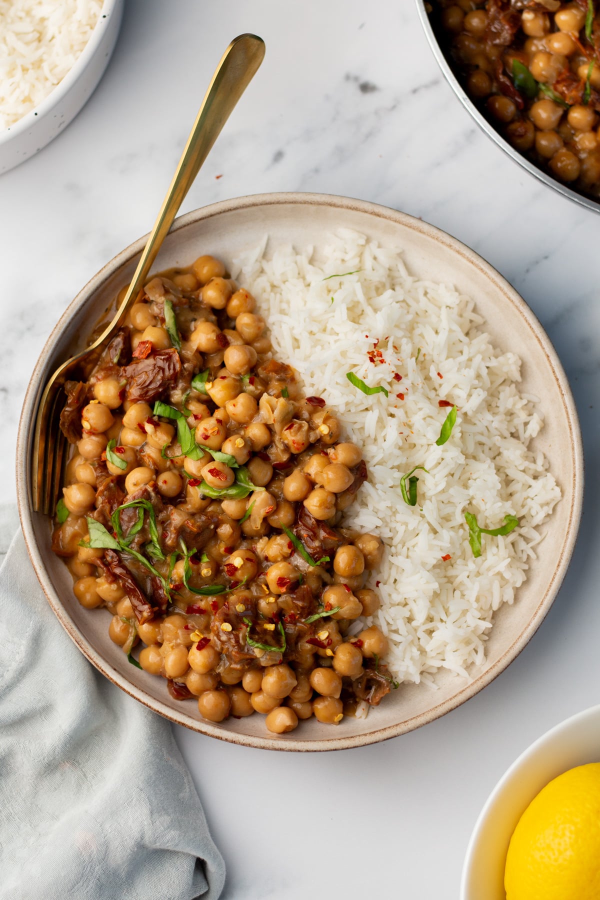 An overhead image of marry me chickepas served on a plate with rice.