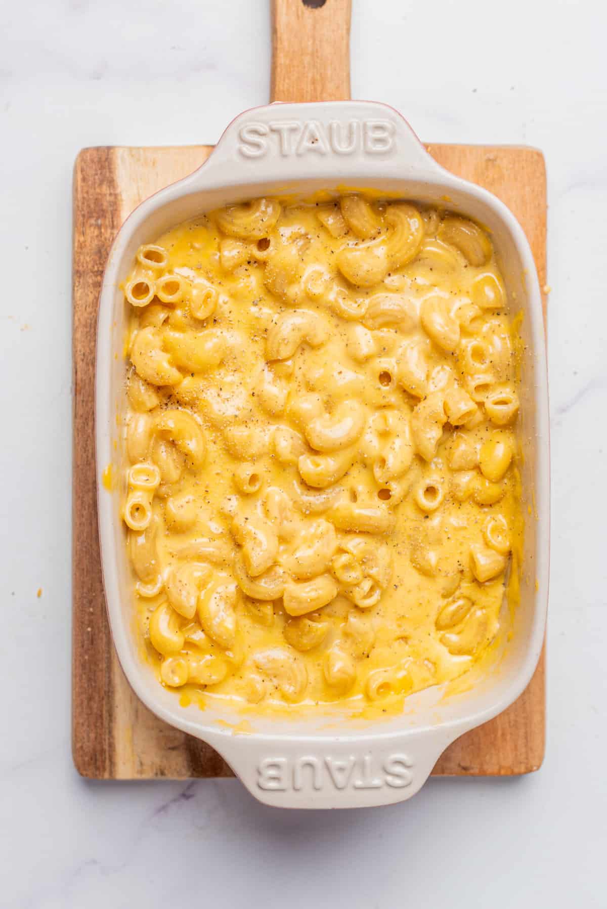 An overhead image of microwave mac and cheese in a serving platter.