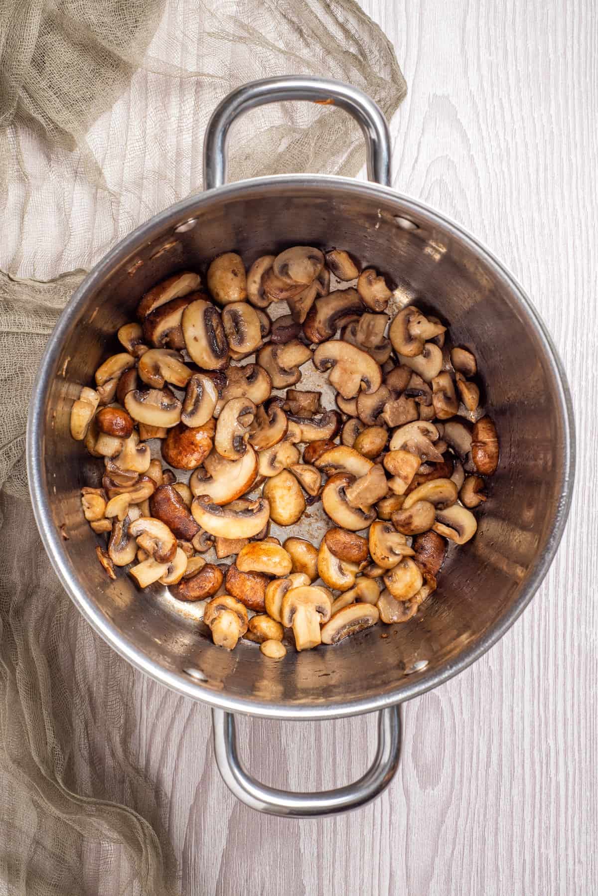 An image of mushrooms in a pot.