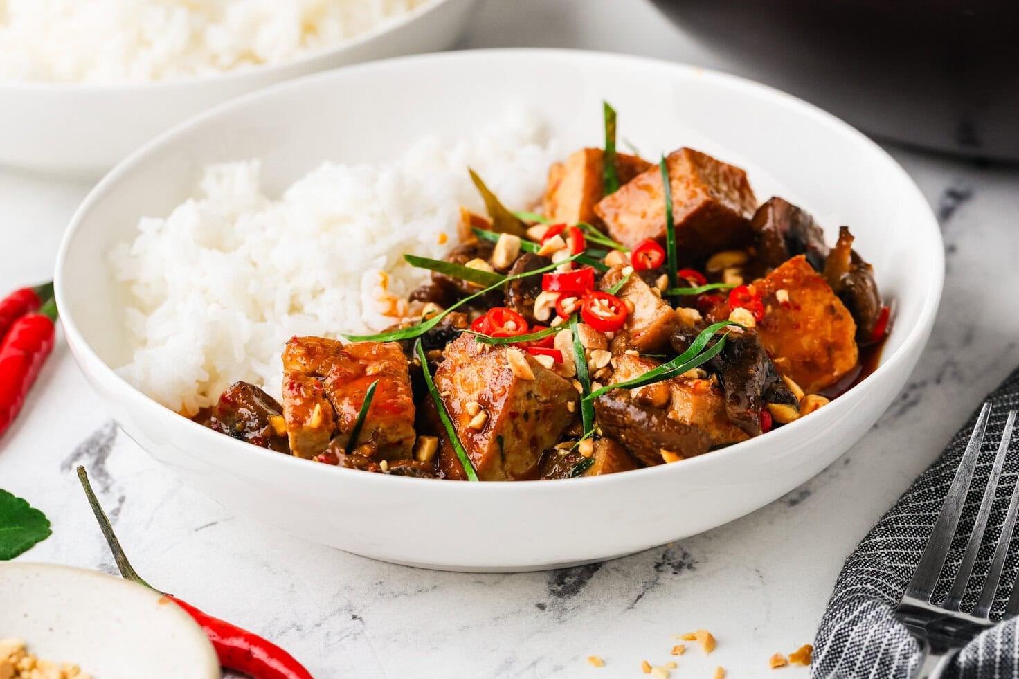 A close up image of panang curry in a bowl.