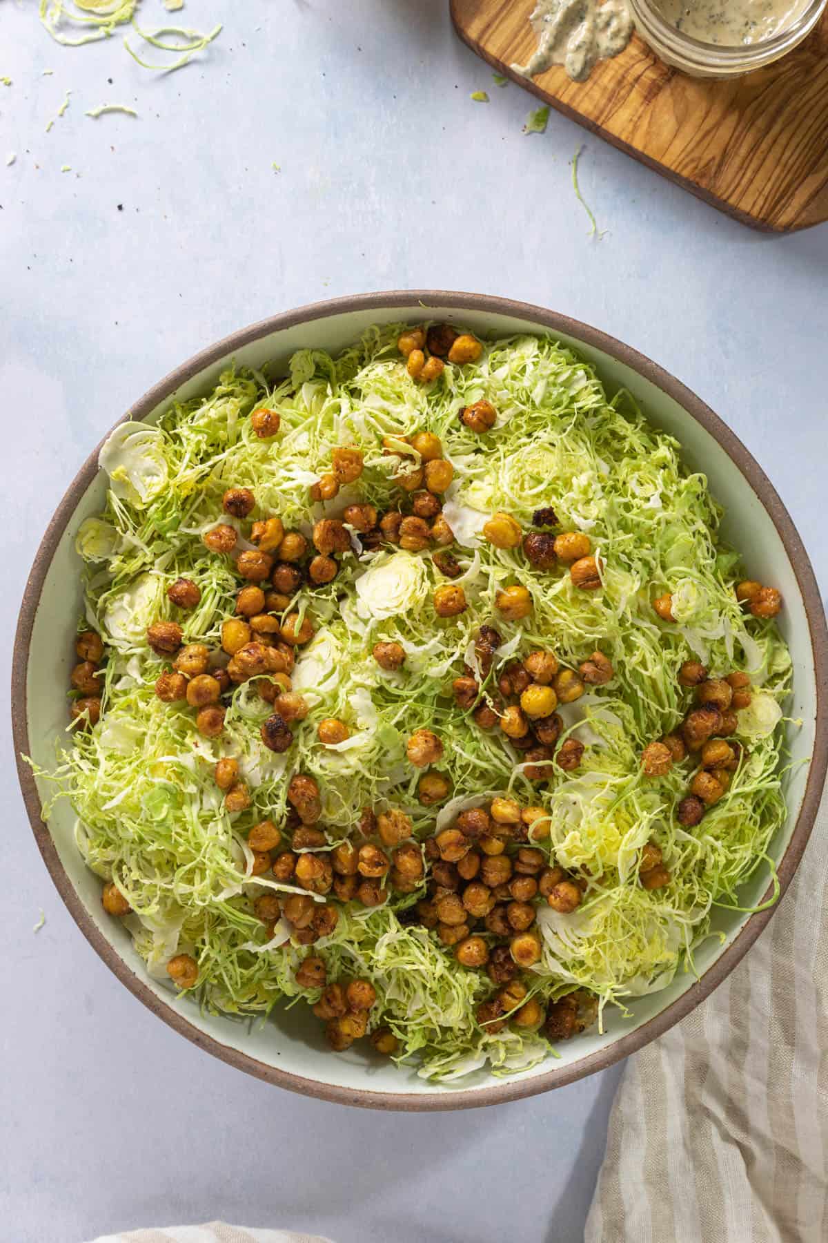 Bowl with shaved Brussels sprouts and roasted chickpea croutons