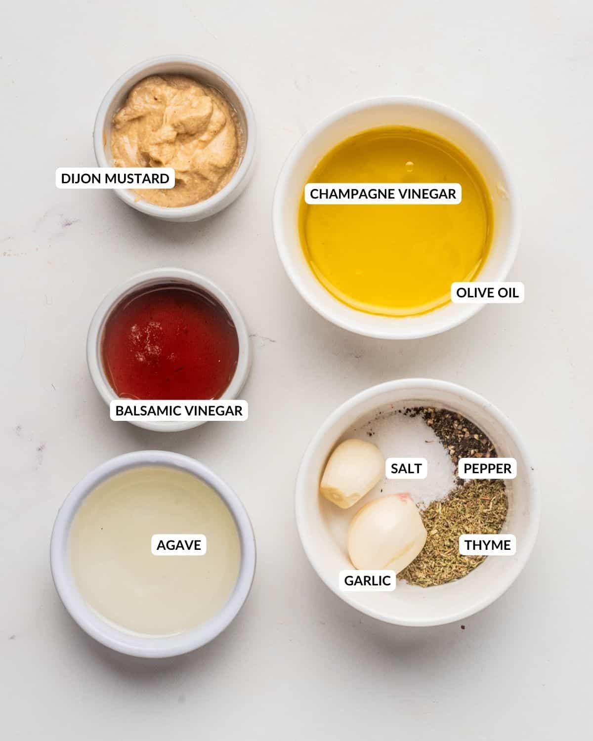 An overhead image of the ingredients of roasted vegetable salad dressing.