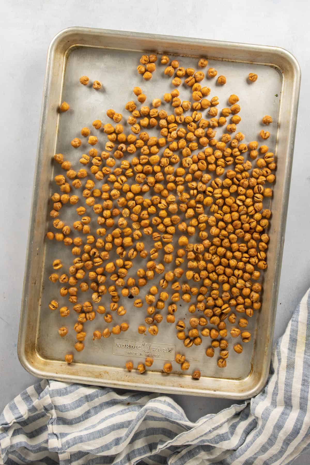 Roasted chana on baking sheet after removing from oven