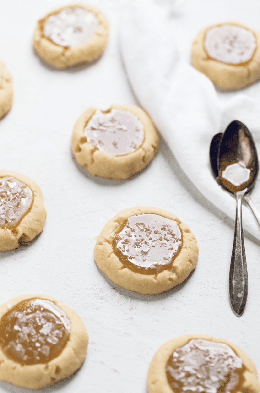 An overhead view of vegan salted caramel cookies with fillings in the center.