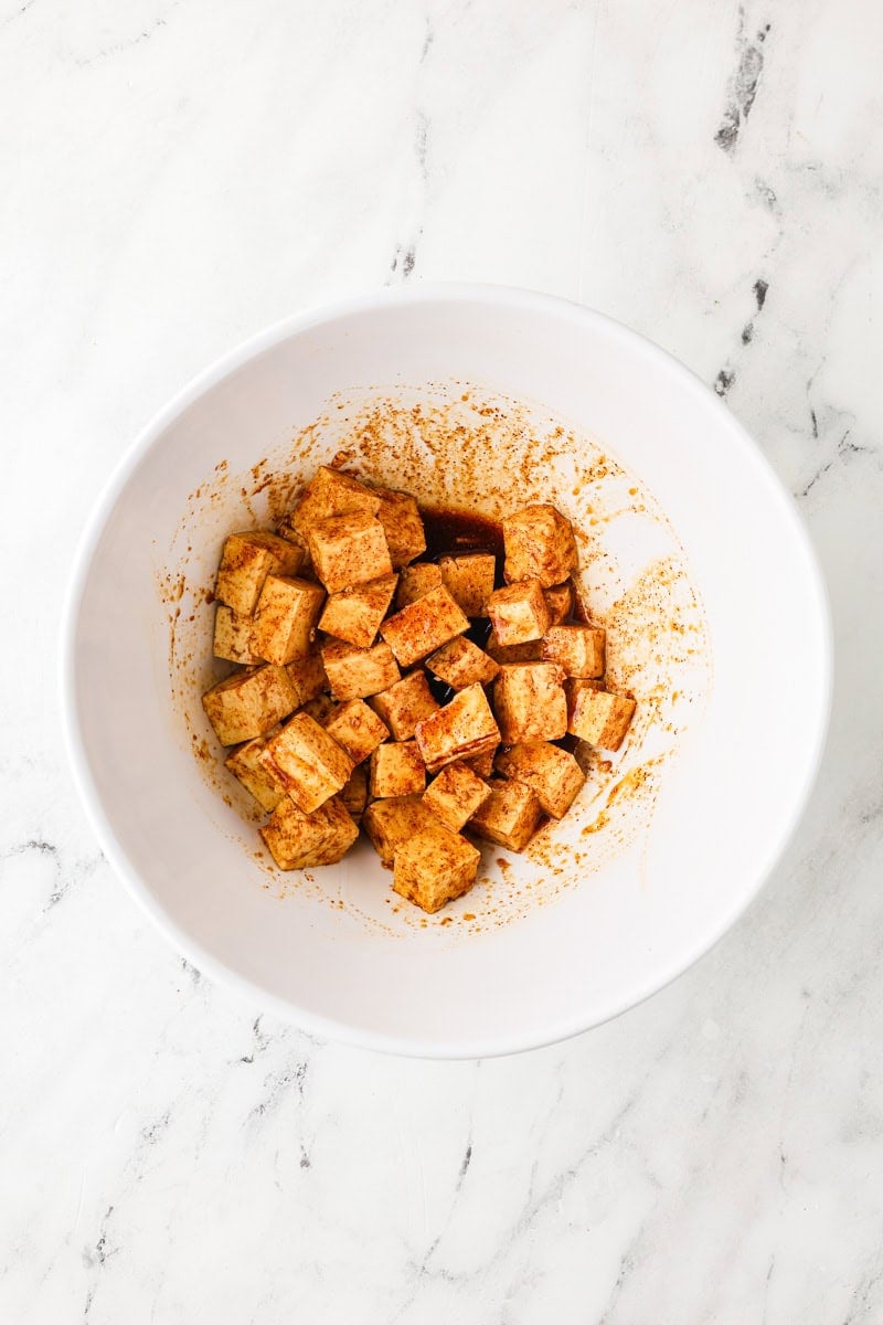 An overhead image of marinating tofu in the soy sauce mixture.