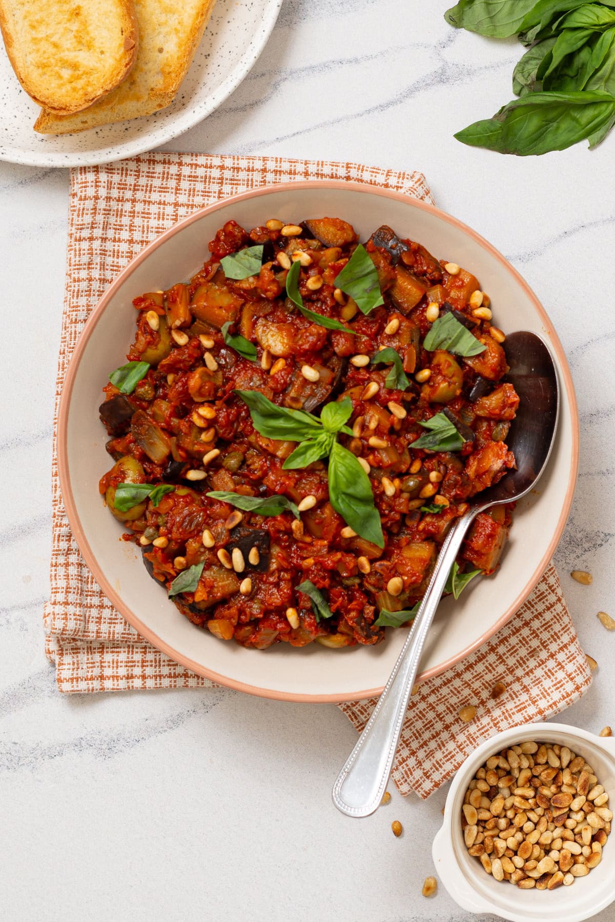 An overhead image of serving the Sicilian caponata in a bowl.