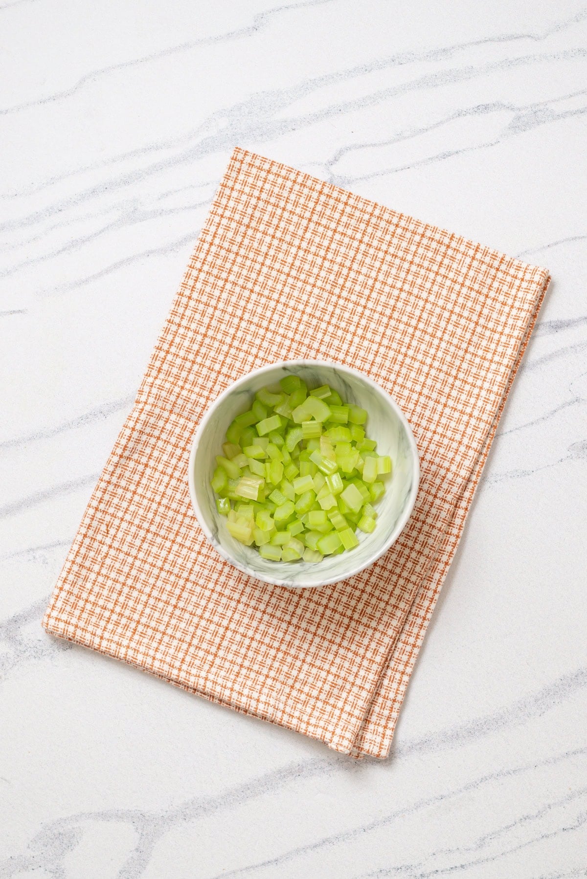 An overhead image of parblanching the celery.