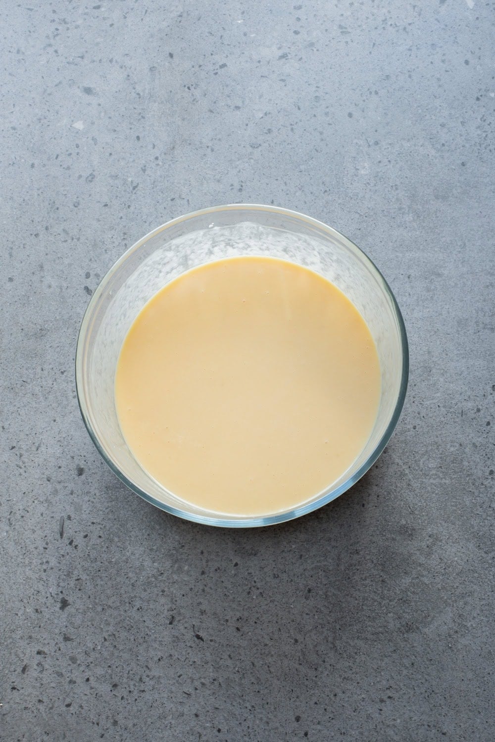 An overhead image of combining the mixture in a bowl.