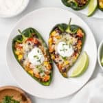 An overhead image of two pieces of stuffed poblano pepper