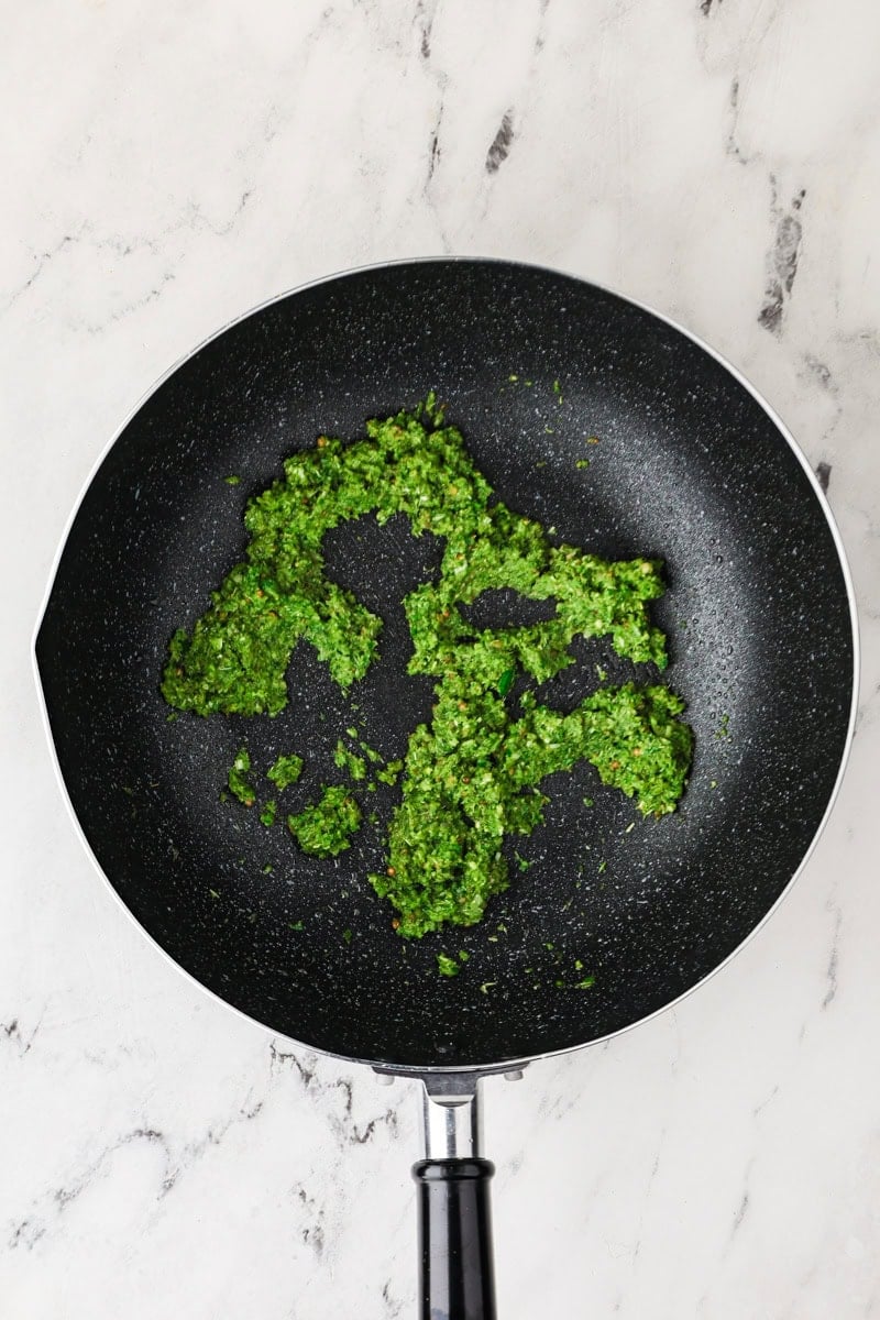 Green curry paste in a pan.