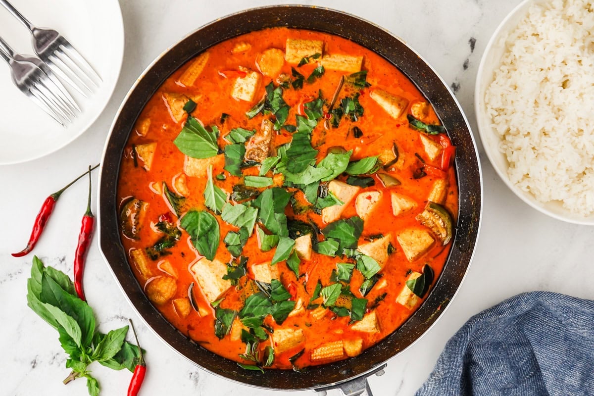 An overhead image of Thai red curry in a skillet.