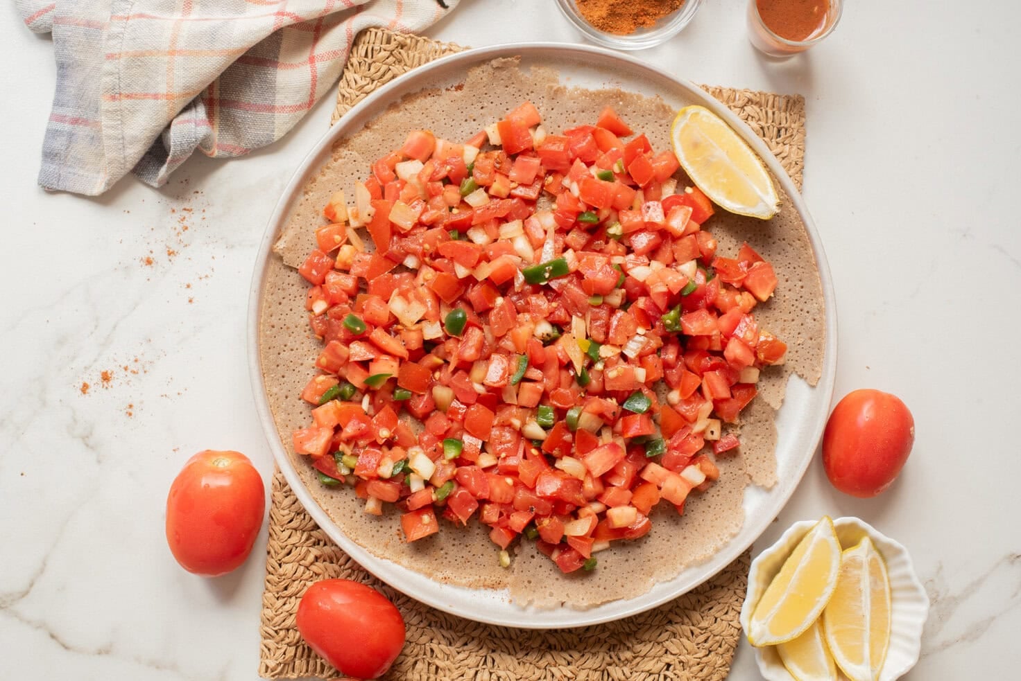 An overhead image of timatim served on a plate.