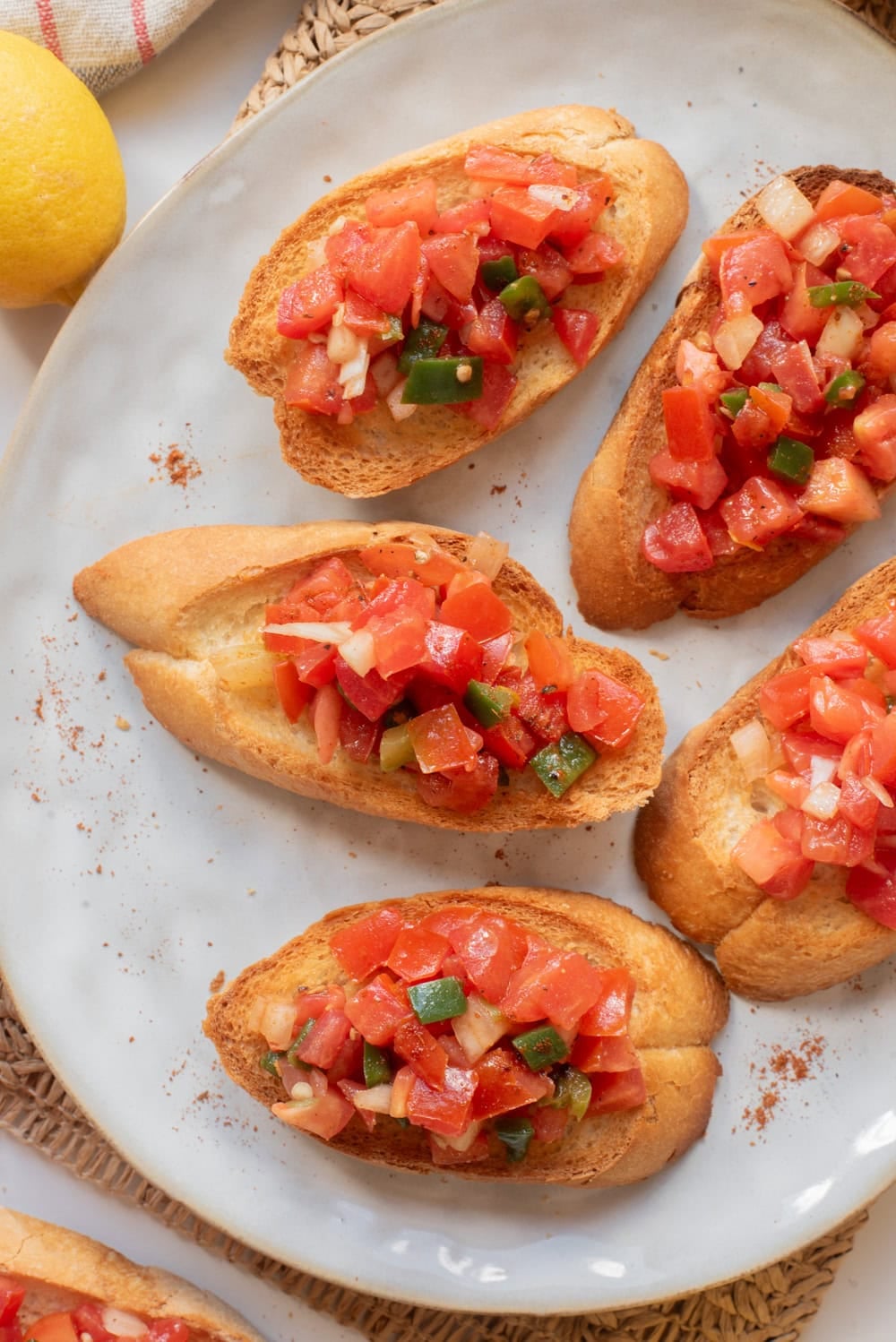 An overhead image of timatim served on toasted bread.