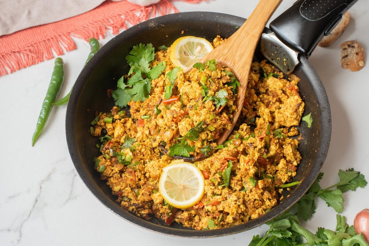 A close up image of tofu bhurji in a skillet.